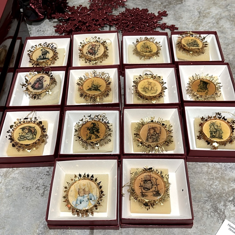 Vintage Hummel gold Christmas ornament collection. Includes 14 pieces